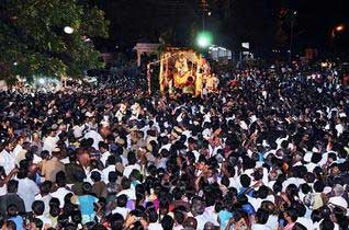Thousands of devotees witnessing the Soorasamharam festival in Palani