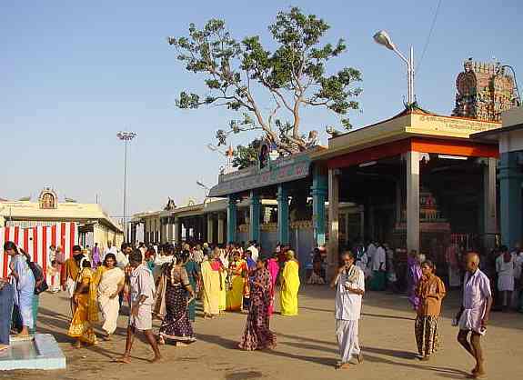 Devotees wash hands and feet before entering Malai Kovil